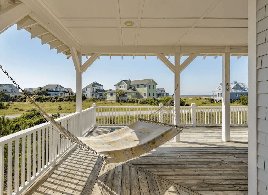 The porch area of a Bald Head Island rental to stay at when celebrating Christmas in this North Carolina town.